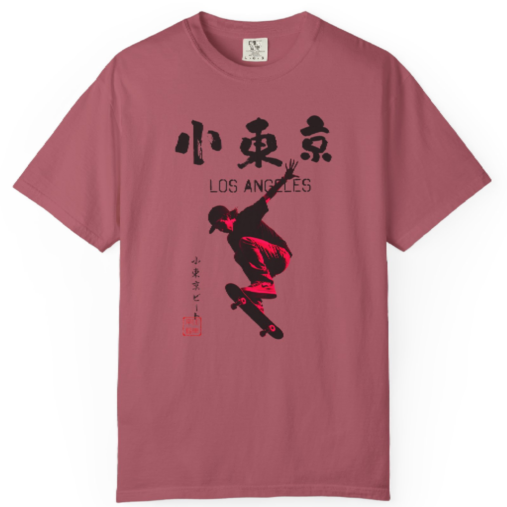Streetwear T-shirt featuring a skateboarder silhouette with Japanese kanji and Los Angeles text on a muted red background.